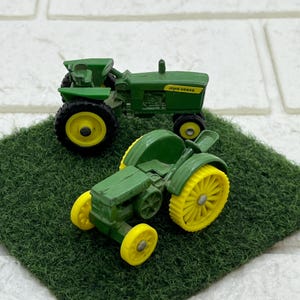 2x Vintage Mini John Deere Tractors . 1:64 Scale Ertl