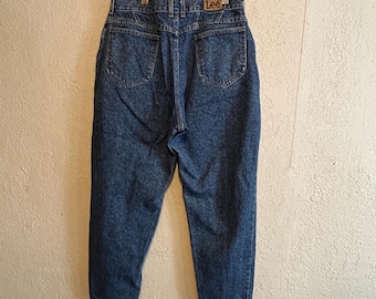 Pantalones vaqueros Lee Riders Vintage de talle alto. 32" x 26". Lavado azul medio oscuro.