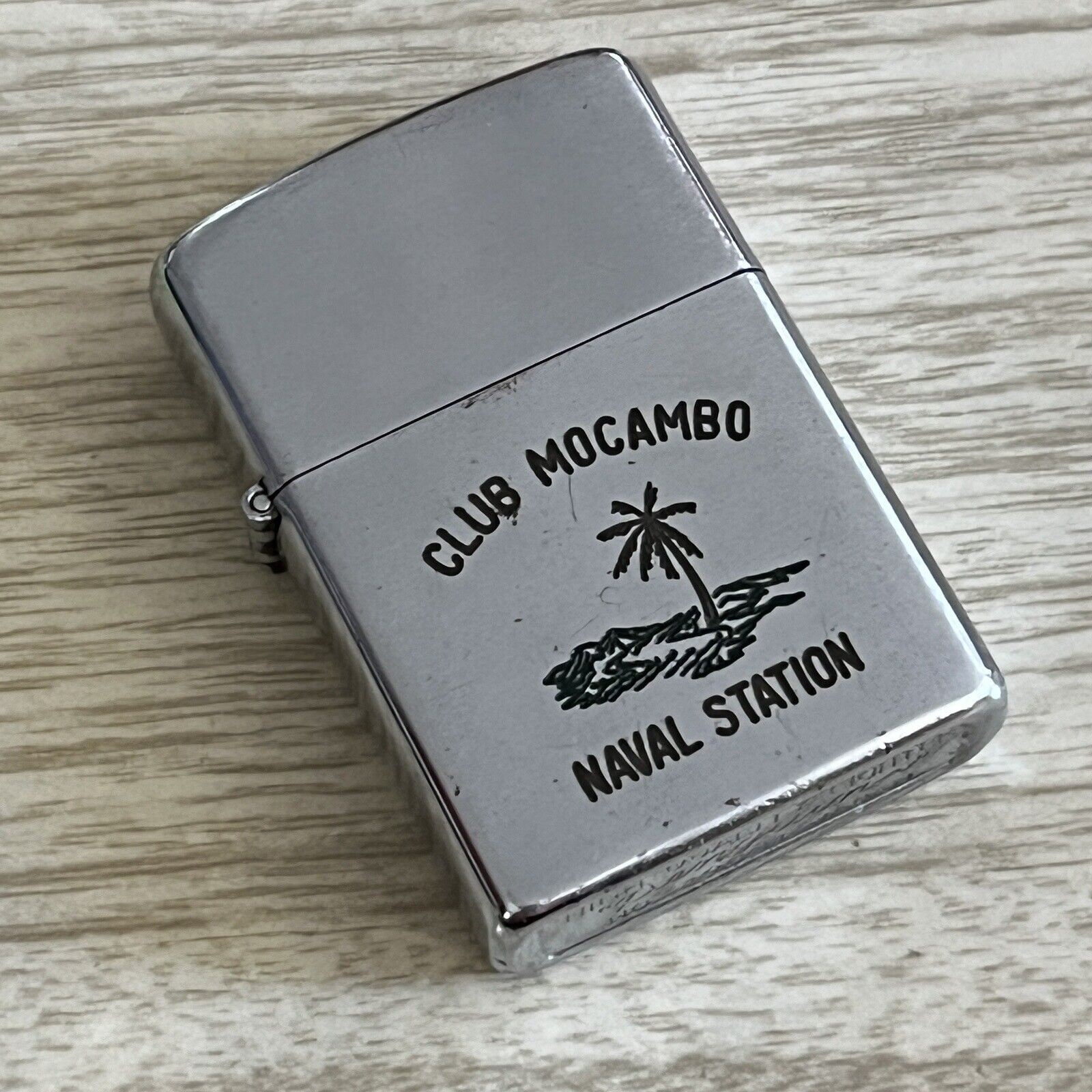 Vintage CLUB MOCAMBO Naval Station Guam . Penguin Lighter . US