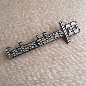 Nice OEM Custom Deluxe 20 Fender Emblem Chevy Truck 1973 1974 1975 1976