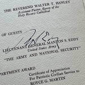 May include: A black and white image of a certificate of appreciation for patriotic civilian service to Royce G. Martin. The certificate is signed by Lieutenant General Manton S. Eddy, United States Army. The text "THE ARMY AND NATIONAL SECURITY" is printed below the signature.