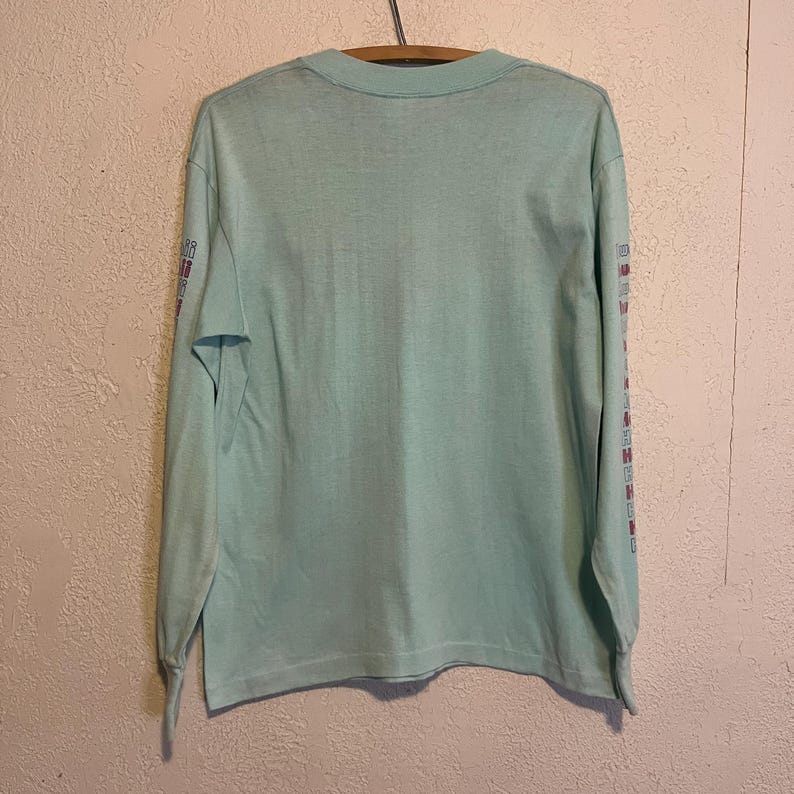 Ein getragenes Vintage 1980er Jahre Langarm Hawaii Hef-T T-Shirt. M Bild 6
