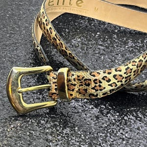 Vintage Metallic Animal Print Skinny Leather Belt . Elite, Fresno California . M