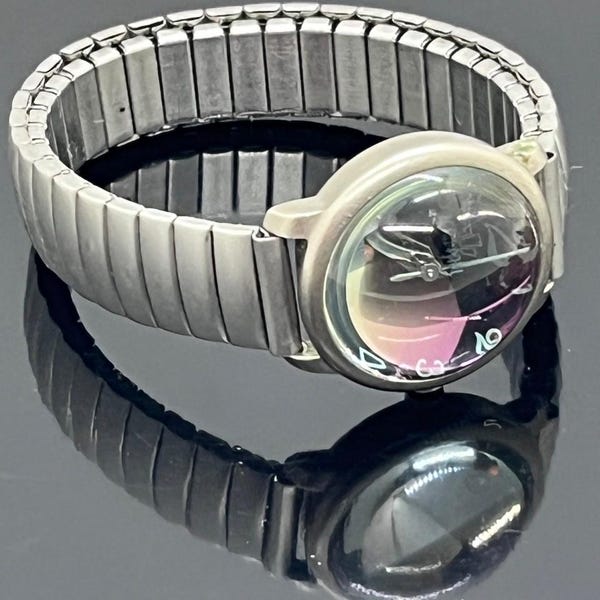 Reloj vintage Jean Paul con esfera de burbuja convexa y correa de expansión de acero inoxidable Cooper en su estado actual