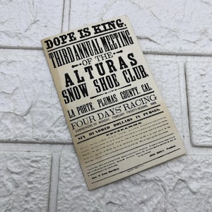 May include: A rectangular off-white paper flyer with black printed text announcing the Third Annual Meeting of the Alturas Snow Shoe Club in La Porte, Plumas County, California, featuring a four-day racing program dated February 22, 1869.
