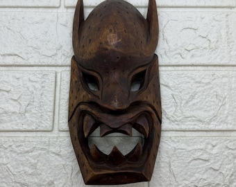 Máscara de demonio con colmillos Bakunawa de madera tallada a mano Mitología filipina Arte popular tribal