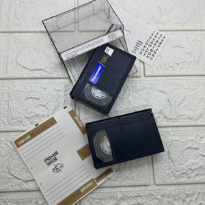 2 cassettes vidéo compactes VHS-C vintage. Panasonic et Maxell