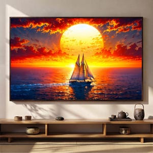 May include: A rectangular wall art print featuring a sailboat on the ocean at sunset. The scene displays a large, bright yellow sun centred above a white-sailed boat, with vibrant orange and red clouds reflecting on the dark blue water surface.