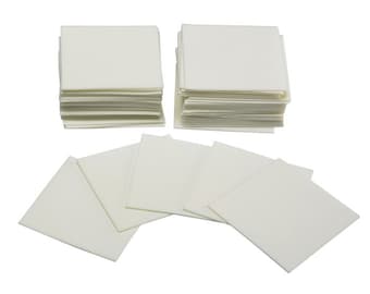 May include: A stack of white cleaning cloths, with some individual cloths laid out on a white background.