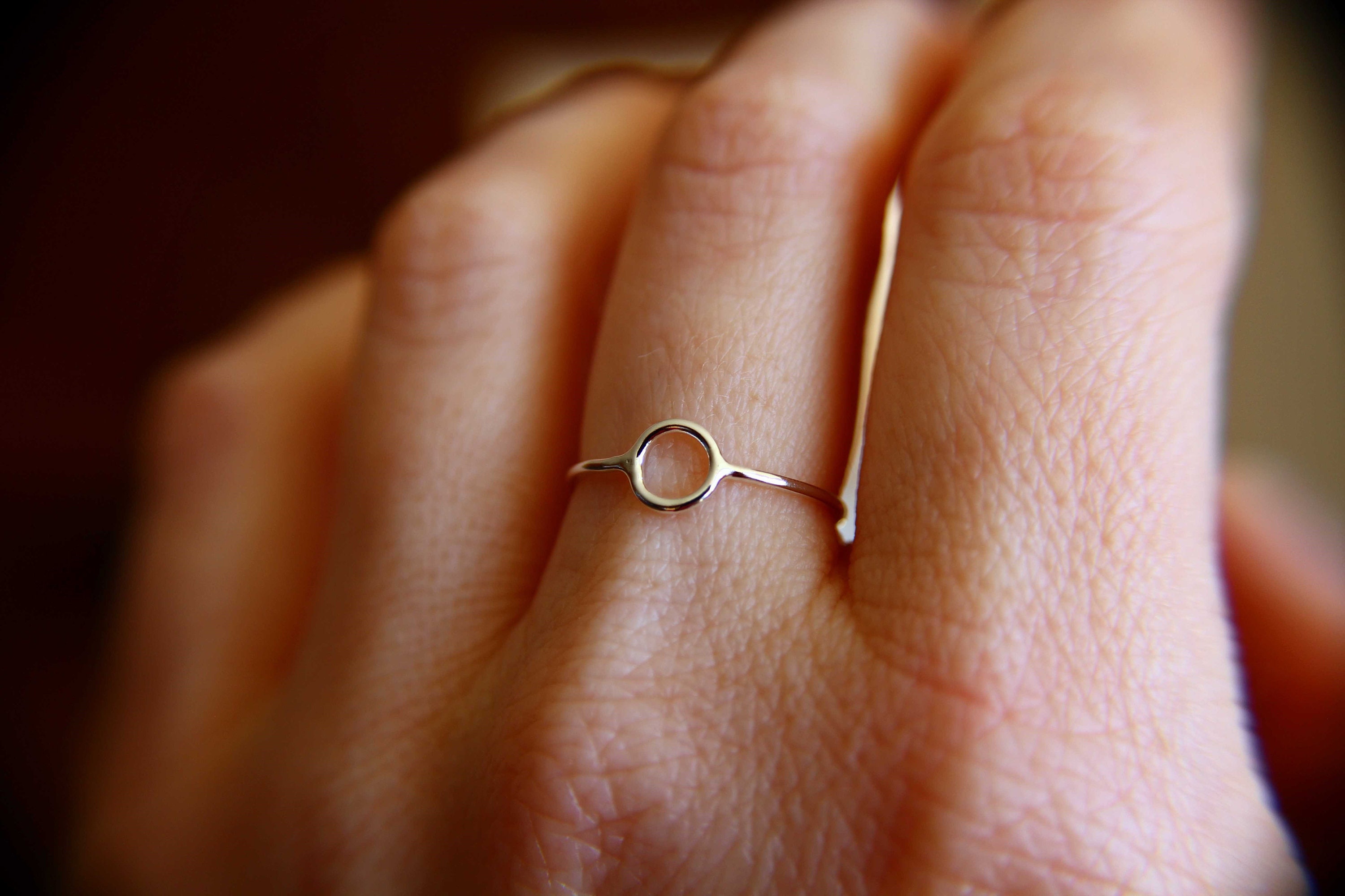 Ring with a circle best sale