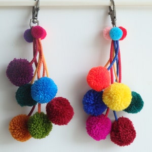 Pom pom bag charm with brass spring clip, home decor, festival fashion, handmade Hmong pom poms with clip, gift for girl