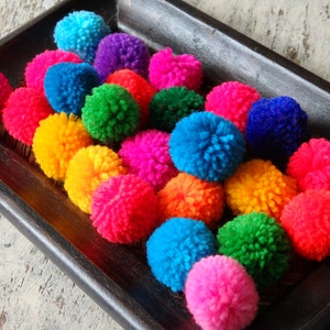 Pompons van de Hmong-bergstam, diverse kleuren