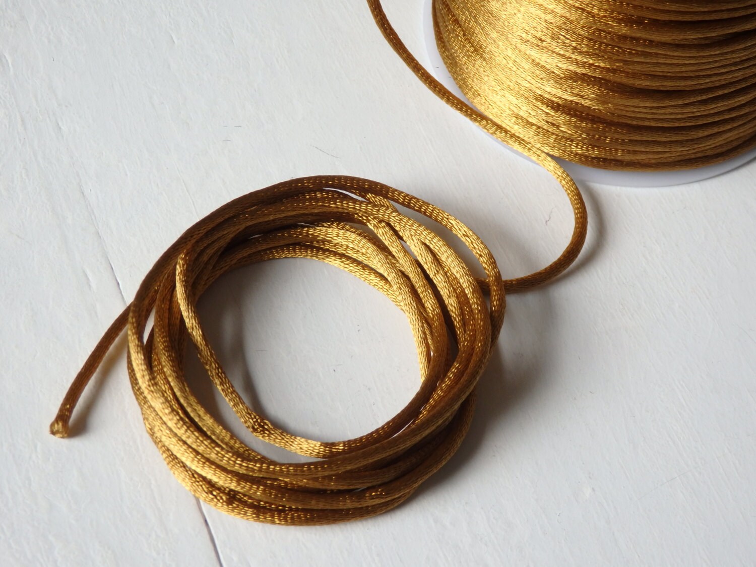 thumbnail image 2 of Red With Gold Metallic Satin Rat Tail Cord Gimp Sewing Trim 2-3mm... 2 of 13