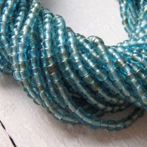 Handmade glass beads from Indonesia, Blues & Greens, 23" strand, 3-4mm, small translucent glass beads from Java, Indonesian glass beads