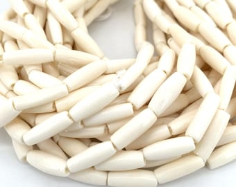 Perline di osso di bue bianco crema: forma tubolare affusolata