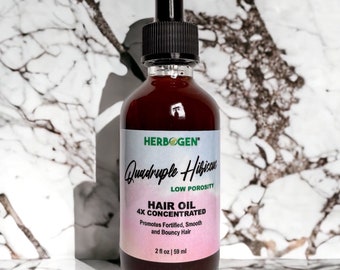 May include: A brown glass bottle with a black dropper top. The label reads "HERBOGEN Quadruple Hibiscus LOW POROSITY HAIR OIL 4X CONCENTRATED Promotes Fortified, Smooth and Bouncy Hair 2 fl oz | 59 ml"