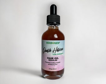 May include: A brown glass bottle with a dropper top, labeled "HERBOGEN Double Hibiscus Low Porosity Hair Oil Regular" and "Promotes Fortified, Smooth and Bouncy Hair". The bottle contains 2 fl oz (59 ml) of hair oil.