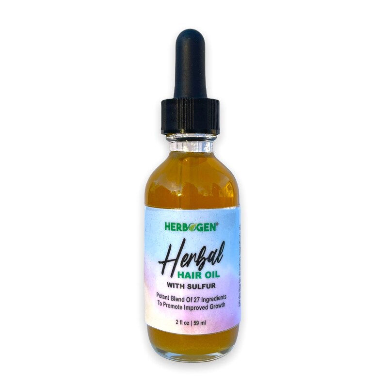 May include: A clear glass bottle with a black dropper top filled with a yellow liquid. The bottle label is white with green text that reads "HERBOGEN" and "Herbal Hair Oil with Sulfur". The label also states "Potent Blend Of 27 Ingredients To Promote Improved Growth" and "2 fl oz | 59 ml".