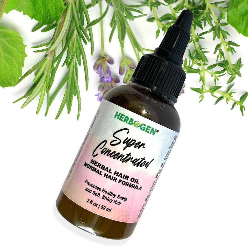 May include: A brown glass bottle with a black dropper top and a green label that reads "HERBOGEN Super Concentrated HERBAL HAIR OIL NORMAL HAIR FORMULA Promotes Healthy Scalp and Soft, Shiny Hair 2 fl oz | 59 ml".