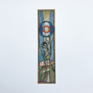 May include: A colorful stained glass bookmark with a blue, red, and white circle in the center, a black and white figure, and a series of overlapping circles in shades of blue, green, and brown.