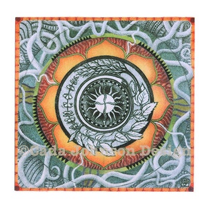 May include: A circular mandala design with a sun and leaves in the center. The mandala is surrounded by a ring of orange, red, and green. The background is a light blue with a pattern of vines.