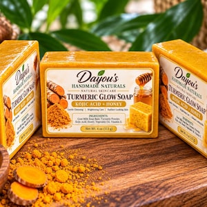 May include: Three rectangular bars of Dayou's Handmade Naturals Turmeric Glow Soap with Kojic Acid and Honey. Each label lists ingredients including goat milk soap base, turmeric powder, kojic acid, honey, vegetable oil, and vitamin E. Net weight 4 oz.
