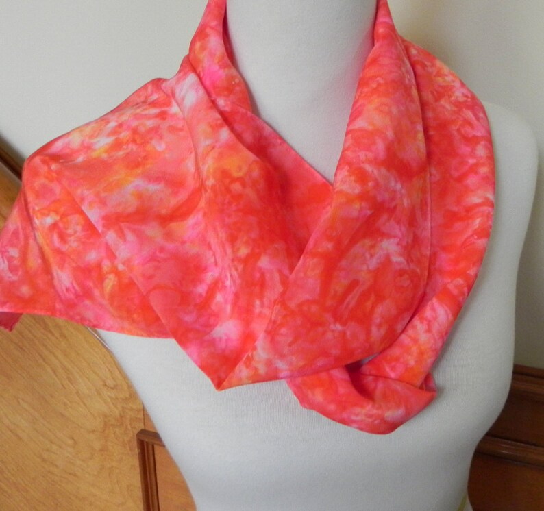 Long hand dyed silk scarf in shades of orange red pink and image 0