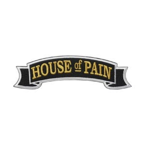 May include: A black embroidered patch in the shape of a curved banner with a white border. The text HOUSE of PAIN is stitched in gold thread across the center of the patch. The design features a classic ribbon style with pointed ends.