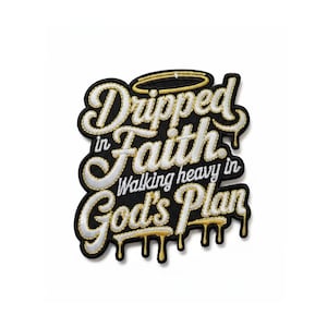 May include: A black embroidered patch featuring white and gold lettering that reads Dripped in Faith Walking heavy in God's Plan. The text has a dripping paint effect at the bottom and a gold halo above the word Dripped, with a black border.