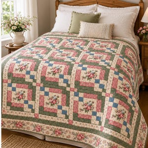 May include: A patchwork quilt featuring a repeating block pattern with floral motifs in shades of pink, green, and blue. The quilt is composed of square segments with rose-patterned centres, framed by solid green and blue borders on a bed.