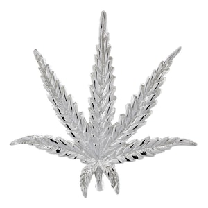 May include: A silver marijuana leaf pendant charm. The leaf is detailed with intricate lines and veins.