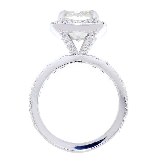 Choosing Between High Set vs. Low Set Engagement Rings | Big diamond  engagement rings, Three stone engagement rings, Low profile engagement rings