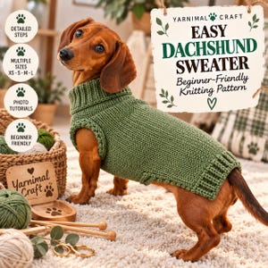 May include: A brown dachshund wearing a green knitted jumper with a ribbed turtleneck and hem. A sign reads YARNIMAL CRAFT EASY DACHSHUND SWEATER Beginner-Friendly Knitting Pattern. Nearby are yarn balls, wooden knitting needles, and a small wooden bowl.