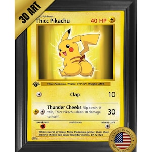 May include: A framed 3D art piece featuring a yellow Pikachu trading card with the text Thicc Pikachu, 40 HP, and attacks named Clap and Thunder Cheeks. The card includes a gold 3D ART banner and a circular Crafted in the USA seal.