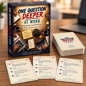 May include: A card game box titled One Question Deeper At Work with 100 questions and 100 follow-ups, featuring a deck of cards and three individual cards displayed on a surface, each printed with Ask, Listen, Go One Question Deeper, and Connect prompts.
