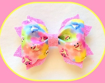 Baby Shark...Baby Shark Bow...Baby Sharks..Pink Baby Shark..Blue Baby Shark..Baby Shark bows...Baby sharks...Pink Glitter Bow..Blue foil Bow