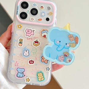 Blue Elephant Grip Pink Kawaii Cover for iPhone 18 17 16 15 Pro Max Clear Jelly Notebook Paper Sticker Pearl Star Strap, Collage, NAKE