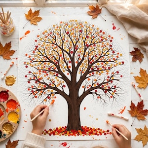 May include: A painting of a tree with a brown trunk and branches, featuring numerous small circular dots in shades of red, orange, and yellow as leaves. The tree is surrounded by scattered dried maple leaves and paint supplies.