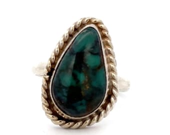 May include: A silver ring with a teardrop-shaped turquoise stone set in a twisted wire bezel.
