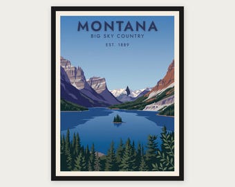 Puede incluir: Un póster de viaje enmarcado que muestra un paisaje de Montana con un lago azul, pinos de color verde oscuro en primer plano y montañas nevadas bajo un cielo despejado. El texto dice MONTANA BIG SKY COUNTRY EST. 1889 en letras azul oscuro.