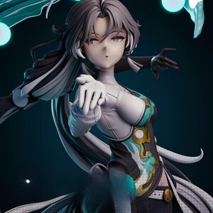 May include: A detailed anime-style figurine of a character with long grey hair, wearing a white and black outfit with teal accents. The figure is posed with one hand extended forward, surrounded by glowing teal energy orbs and flowing liquid effects.