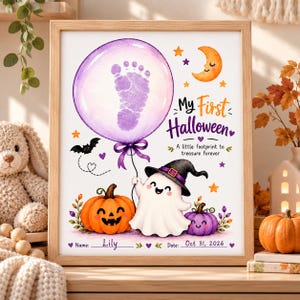 May include: A framed print featuring a purple balloon with a baby footprint inside, a smiling ghost wearing a witch hat, an orange pumpkin, a purple pumpkin, a crescent moon, and the text My First Halloween A little footprint to treasure forever.