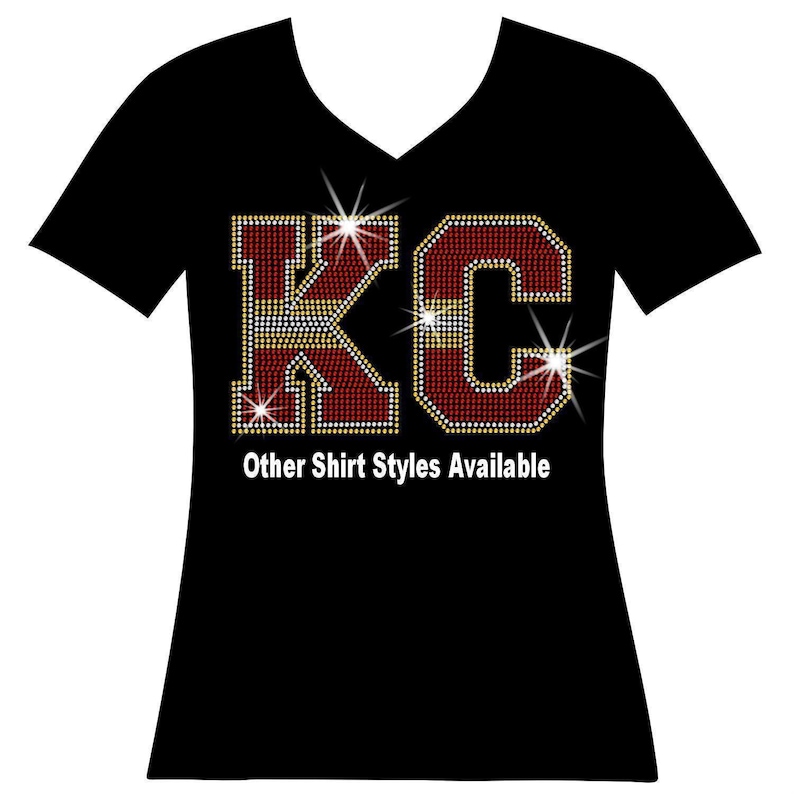 a t - shirt with the kcc logo on it