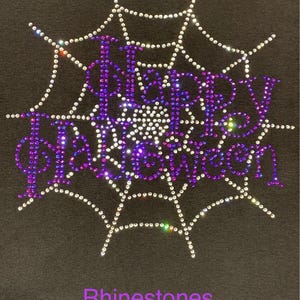 This is an actual picture of our Happy Halloween rhinestone shirt with sparkling spider web inspired design, spooky Halloween apparel for parties, trick or treating and October celebrations in rhinestones.