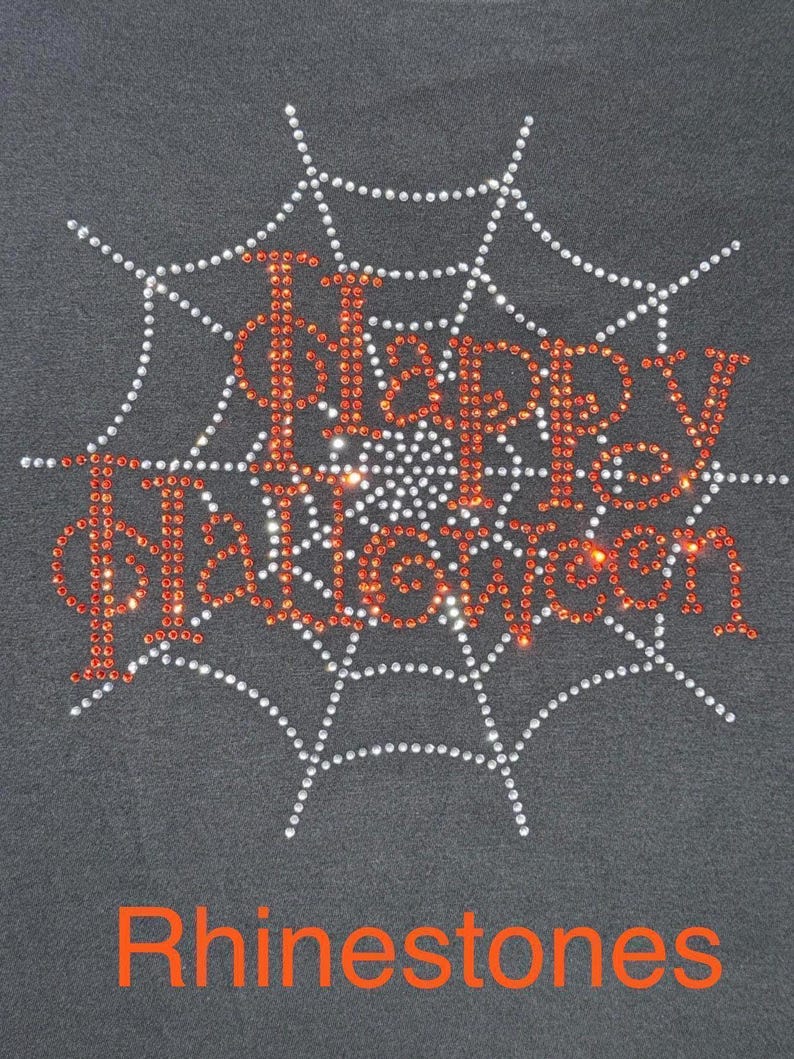 This is an actual picture of our Happy Halloween rhinestone shirt with sparkling spider web inspired design, spooky Halloween apparel for parties, trick or treating and October celebrations in rhinestones.