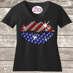Sparkling rhinestone American flag lips shirt on a black t-shirt, patriotic bling tee for women with red white and blue lips design.