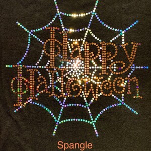 This is an actual picture of our Happy Halloween rhinestone shirt with sparkling spider web inspired design, spooky Halloween apparel for parties, trick or treating and October celebrations in spangle.