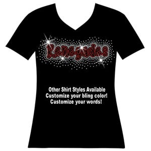 May include: A black V-neck t-shirt featuring the word Renegades in red rhinestones surrounded by a white rhinestone starburst pattern. Below the graphic, white text reads: Other Shirt Styles Available. Customize your bling color! Customize your words!