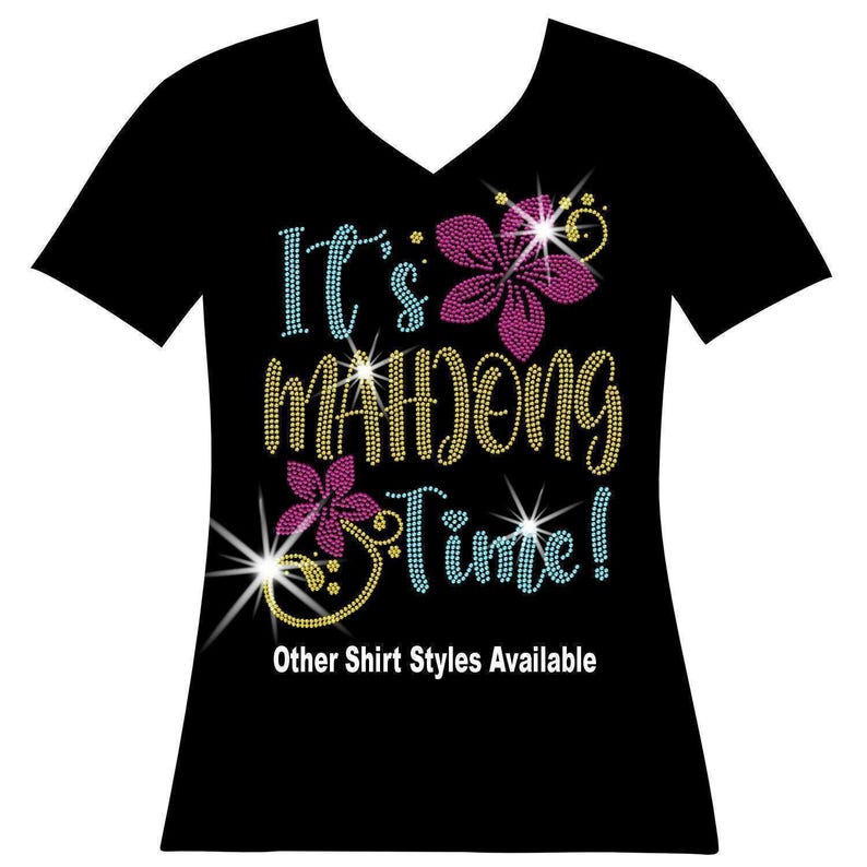 Its mahjong time Thousands of shimmering, sparkling rhinestones makeup this lucky mahjong shirt. The scriptisfun and is in yellow and teal. The flowers and ivy is in hot pink and yellow. Show off your skills with this bright fun mahjong bling shirt