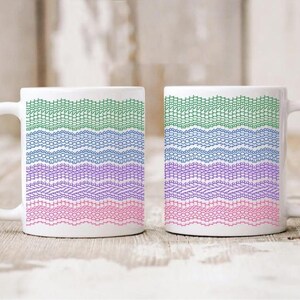 May include: Two white ceramic mugs featuring horizontal wavy lines composed of the repeated text "I DONT HAVE TIME FOR YOUR BULLSHIT". The text appears in four distinct colors: green, blue, purple, and pink, arranged in a repeating pattern.